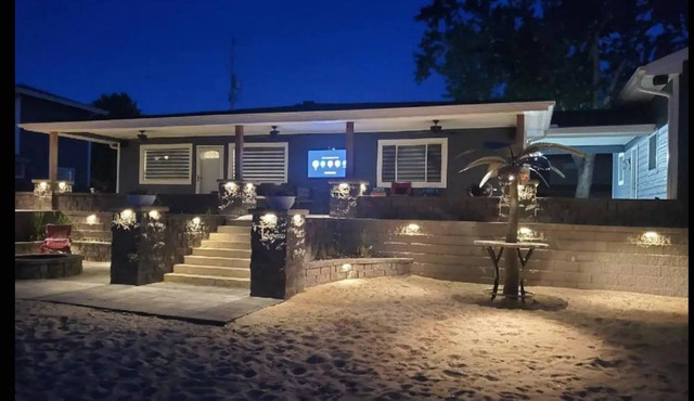 Newly remodeled Beachfront home on privately owned lake .
