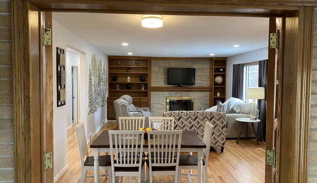 Newly Remodeled Brick Home with wall Sculptures by the Airport