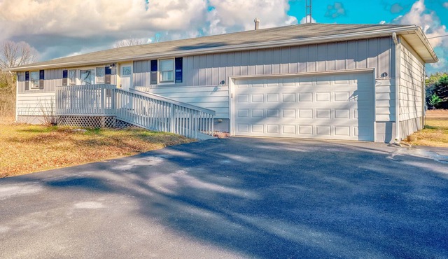 Newly Remodeled on 3 Acres, across from Golf Course!