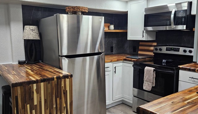 Newly renovated 1934 6-bedroom, 3 bath, 2 full kitchen, kitchenette & 2 laundry