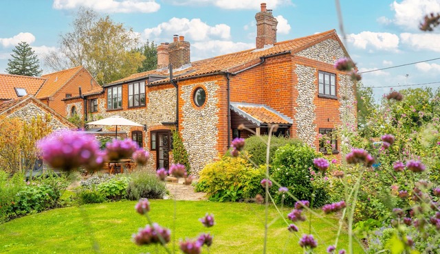 Newly renovated Brick & Flint cottage with stylish interiors, wood burning stove, beautiful garden