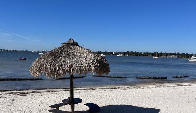 Newly renovated condo in gated community. Private beach 2 heated pools, hot tub