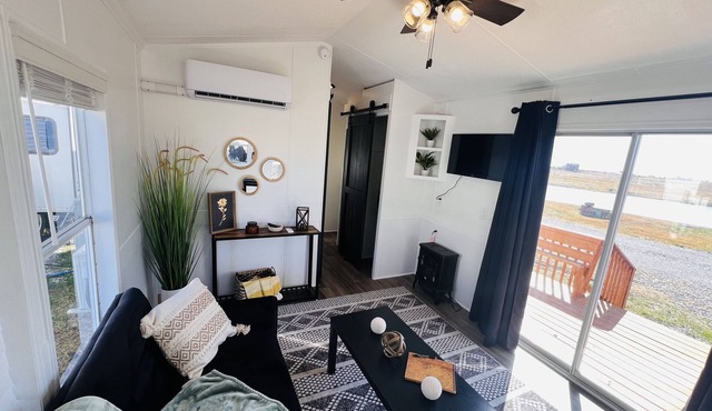 NEWLY renovated cottage located right off I-49 in Archie, MO.