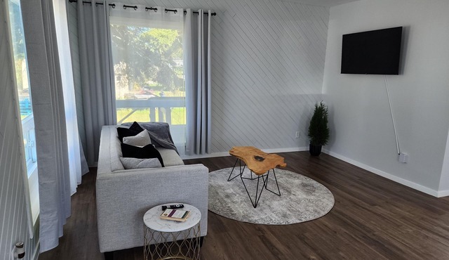 Newly renovated home in the heart of Cochrane close to lake and downtown