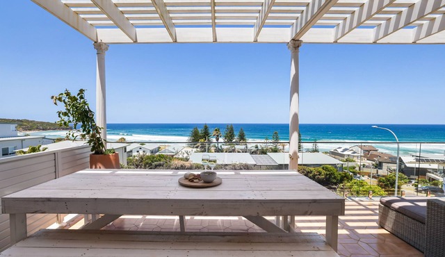 Newly renovated serene beachfront home. Amazing 180 degree ocean views & pool.