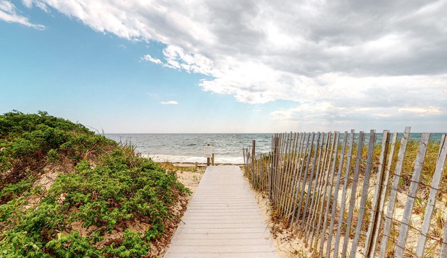 Newly Renovated Studio with AC, Grill – steps from Private Beach