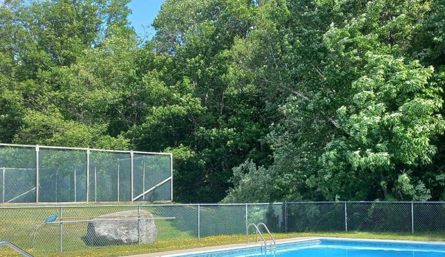 Newly renovated townhouse with tennis court and pool.