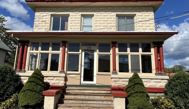 Newly Renovated Waterfront Home with Protected Boat Slip in Alexandria Bay NY.