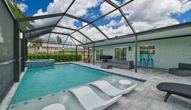 Newly Renovated house on the canal with pool and hot tub!