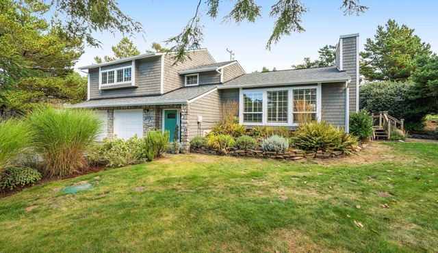 Newly updated, dog-friendly house near the beach with hot tub & grill
