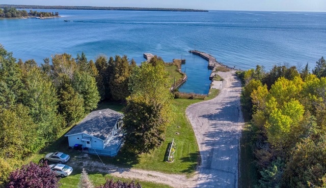 Newly updated Lake Michigan Waterfront with pier for boats! Room for trailer!