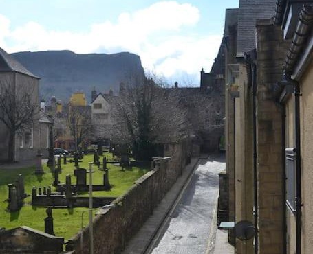 Next to the Palace and Royal Mile with parking