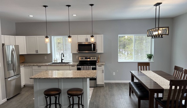 Nice family home on golf course and snowmobile/bike trail.