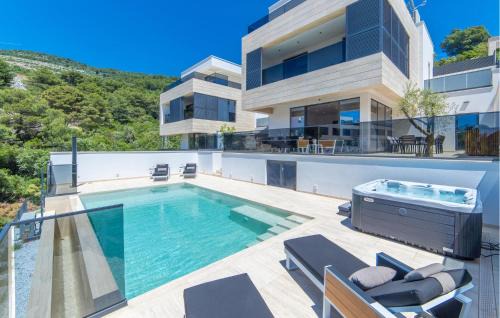 Nice Home In Komarna With Heated Swimming Pool