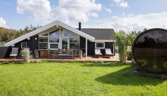 Nice home in øster assels with sauna