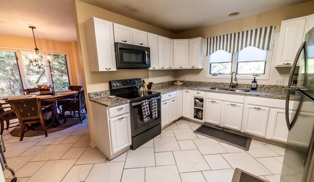 Nice Home Located Near Golf Complex Offers Many Amenities at Affordable Price!