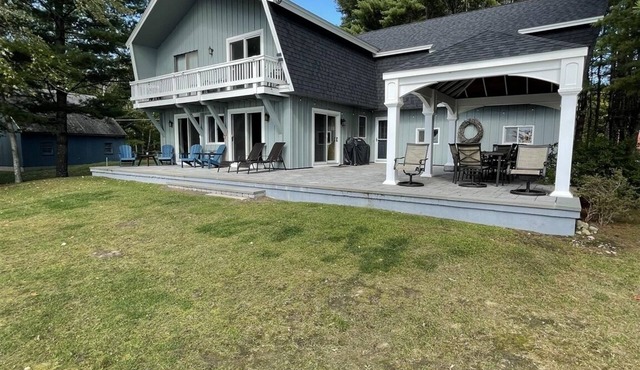 Nicely appointed four bedroom shorefront home