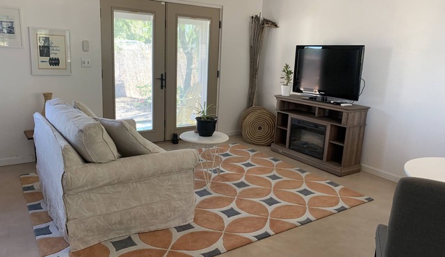 NO HOST/CLEANING FEES for this East Side Studio! Private yard and shared pool!