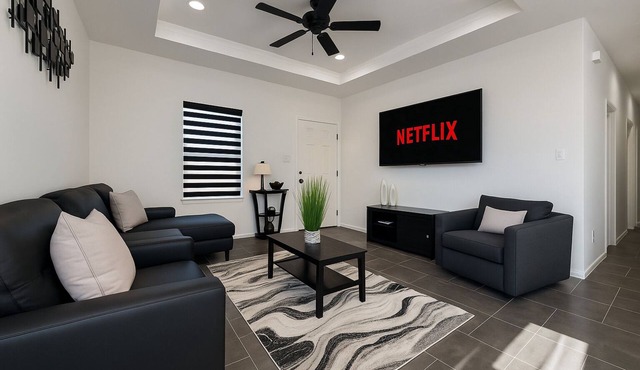 Noir: Stylish 3BR w'TV's All Rooms +Workspace & Yard
