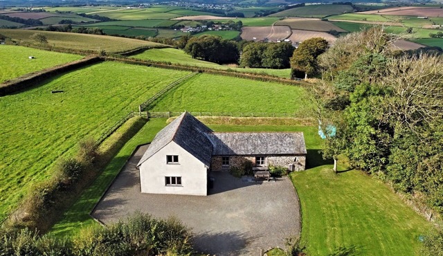 North Devon Countryside Escape. Dog friendly with views, large garden & paddock.