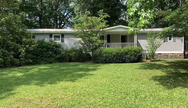 NOT-SO-ORDINARY TRAILER! A lovely getaway on The Little Red River with hot tub