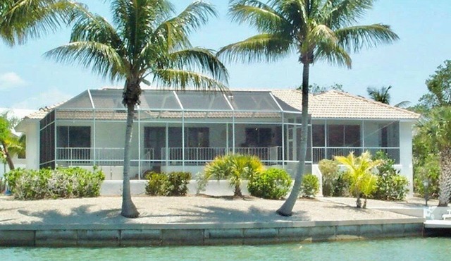 Now Available! Enjoy Panoramic Water Views, Pool, Dock, Beach Parking Permit & Pup Friendly!