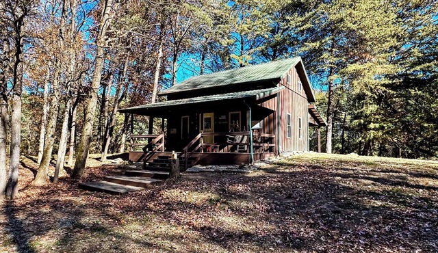 nPine Oaks Cabin includes Guest Pole Barn. Modern comfort meets county living.