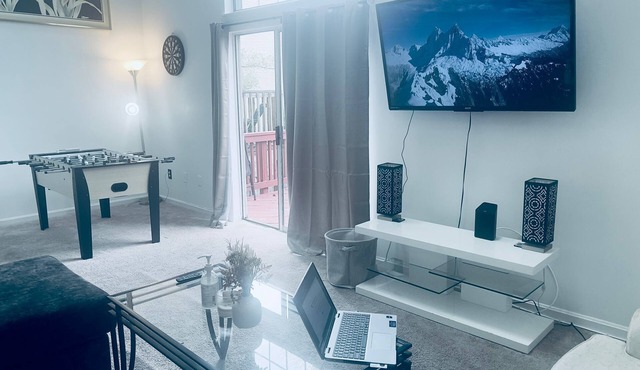 nRoyal Place: Three-Story Townhouse with Balcony & Workspace