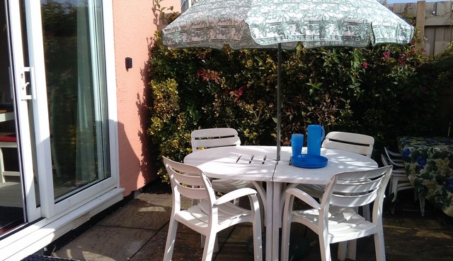 Number Nine is a coastal snug in a quiet area, just a short walk to the shore.