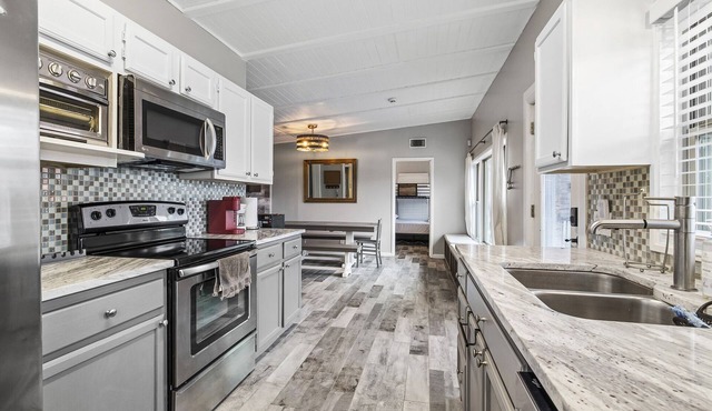 Oasis Cottage! Steps to Lake Travis! Tesla Ready!