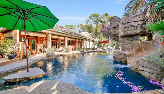 Oasis Resort-resort Spa/pool With Slide, Large Tiki Huts, And Garden Paths. Ahh!