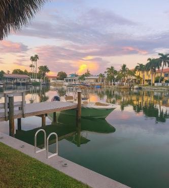 Oasis Waterfront Treasure Island Apartment with Patio Dock and Johns Pass