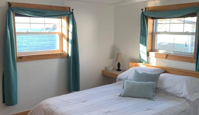 Ocean Breeze offers modern amenities in a renovated saltbox house.