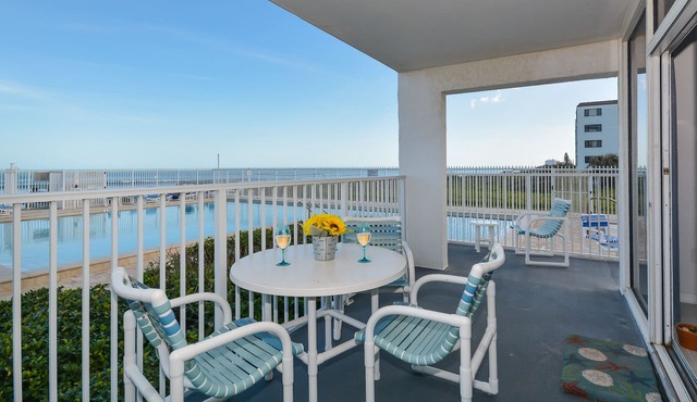 Ocean Condo 104 ~ Ground Floor Corner Condo with wrap around balcony! Walk right out to Pool!