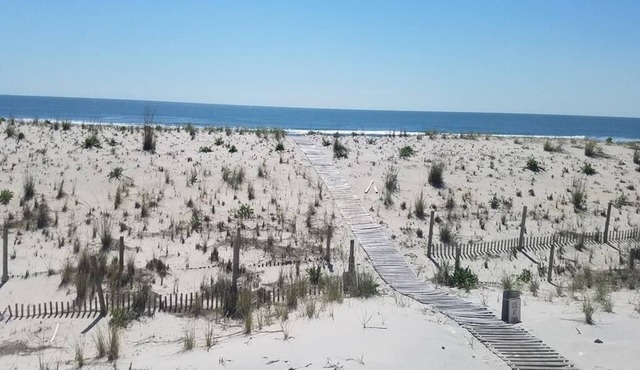Ocean Front 1st floor duplex with expansive views in Brant Beach with private.