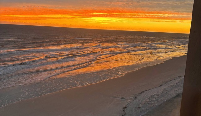 Ocean Front Condo. n Wake up to sunrises & ocean waves crashing on the beach.