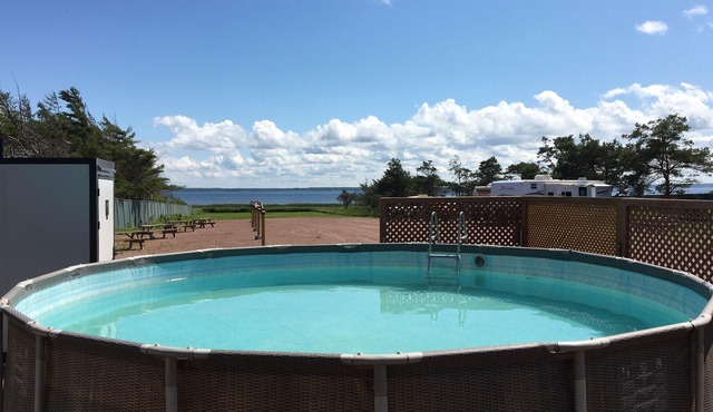 Ocean Front Cozy Cottage Home on Private Beach & Boardwalk With Pool