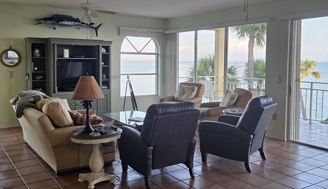 Ocean front gated privacy with 3 bedrooms and protected boat slip.