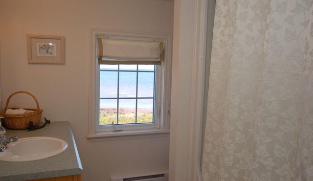 Ocean-front gem on large, private lot.