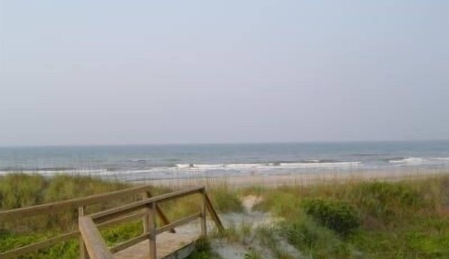 Ocean-side condominium with pool. Fully-equipped for relaxed vacationing.