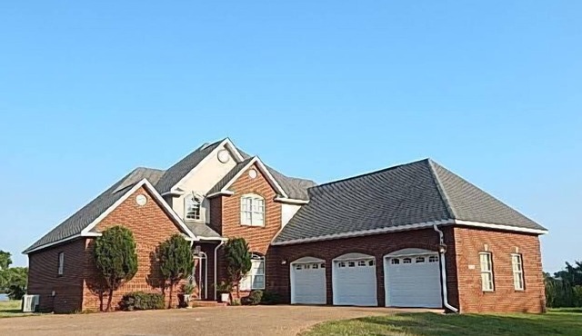 OCEAN SPRINGS/BILOXI AREA 4 BR 4 BA 4,900 SF W/3 CAR GAR ON THE BAY W VIEWS