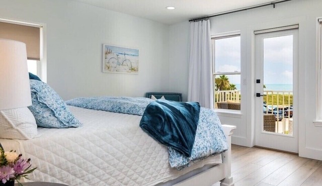 Ocean View! 100 steps to feet in the sand! Super Clean!