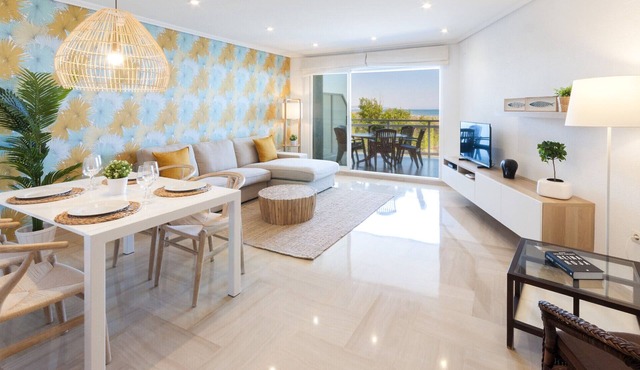 Ocean view condo located steps from the beach. Modern decoration! ONLY FAMILIES