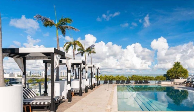Ocean View Elegance | Rooftop Pool, Beach Access