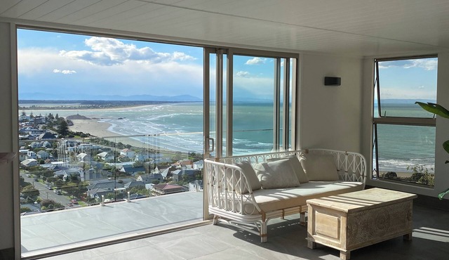 Ocean-view escape: 4 bedrooms, heated pool, sauna, and expansive terraces