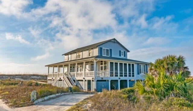 Ocean view home, remodeled with large bedrooms and living space! Wrap around porches for enjoyment