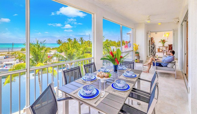 Ocean View Two Duplex Penthouses/Retreat amenities: tennis court, heated Pool | Vista Key