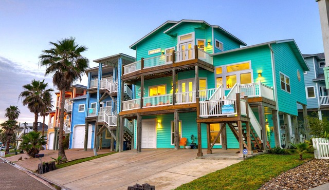 Ocean views from two decks + beach boardwalk across the street + heated pool
