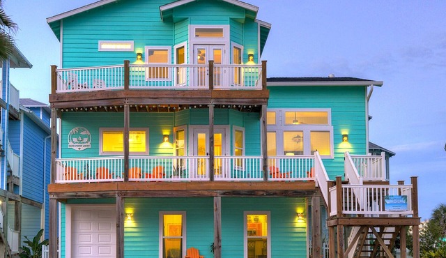 Ocean views from two decks + beach boardwalk across the street + heated pool