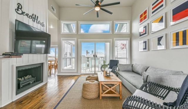 OCEAN VIEWS! Steps away from the sand!